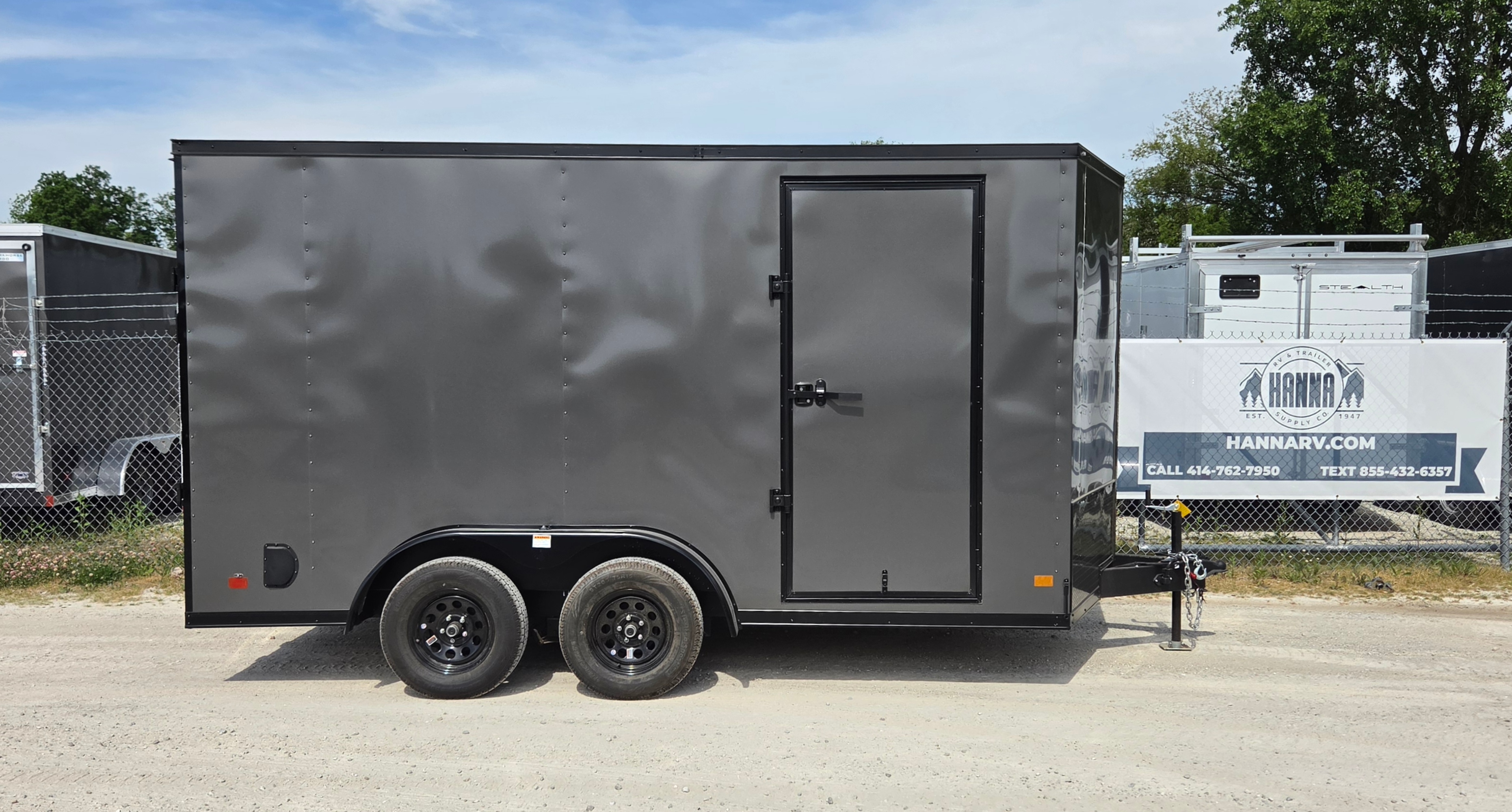 DarkHorse 7.5X14 Wedge Nose Tandem Axle Steel Cargo Trailer with Ramp Door, 6" Extra Height - 2500 Series - Charcoal with Blackout Package